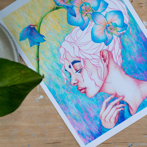 Peripheral Print Sitting Next to a Pothos Plant