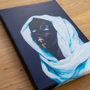 Reflection Canvas Print sitting on a wood table